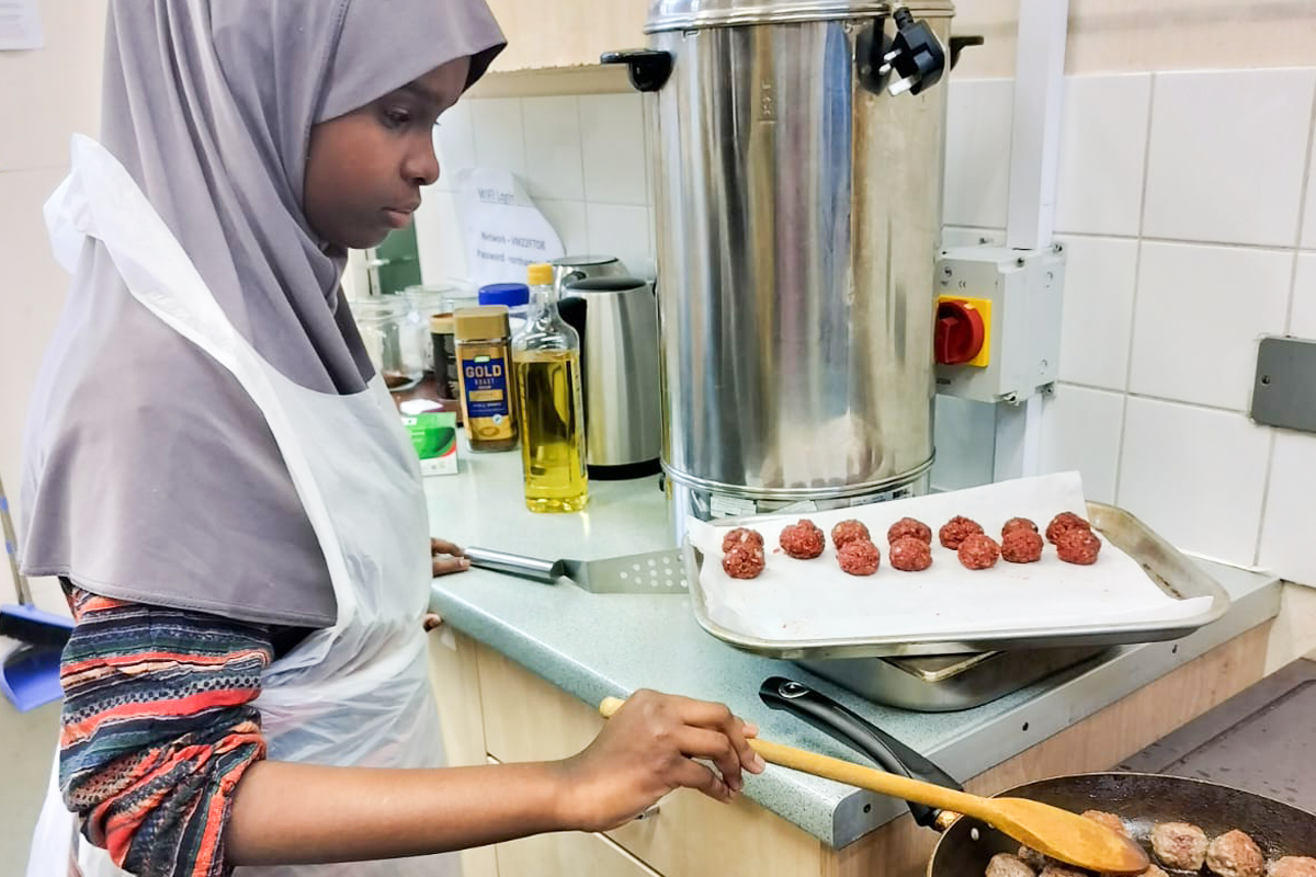 A cookery skills session in the community kitchen